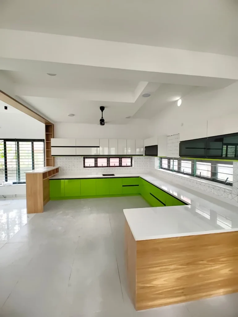 Large U-shaped lime green kitchen with an oak island, Trivandrum