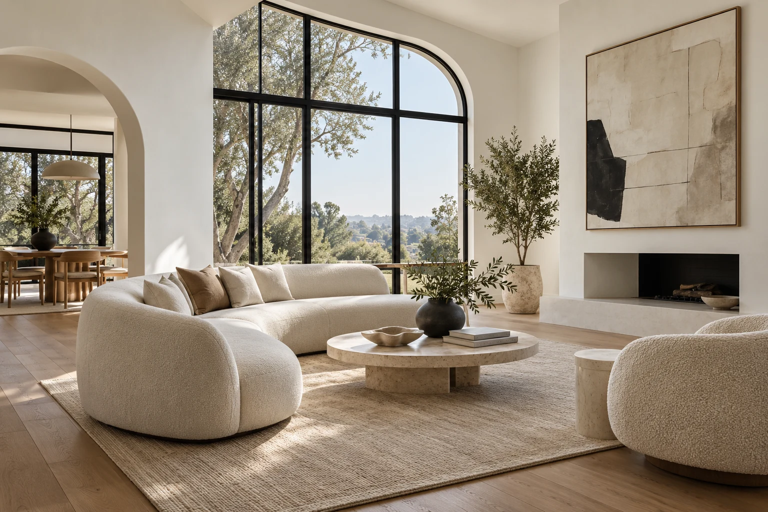 A bright modern living space with natural light and sculptural furniture