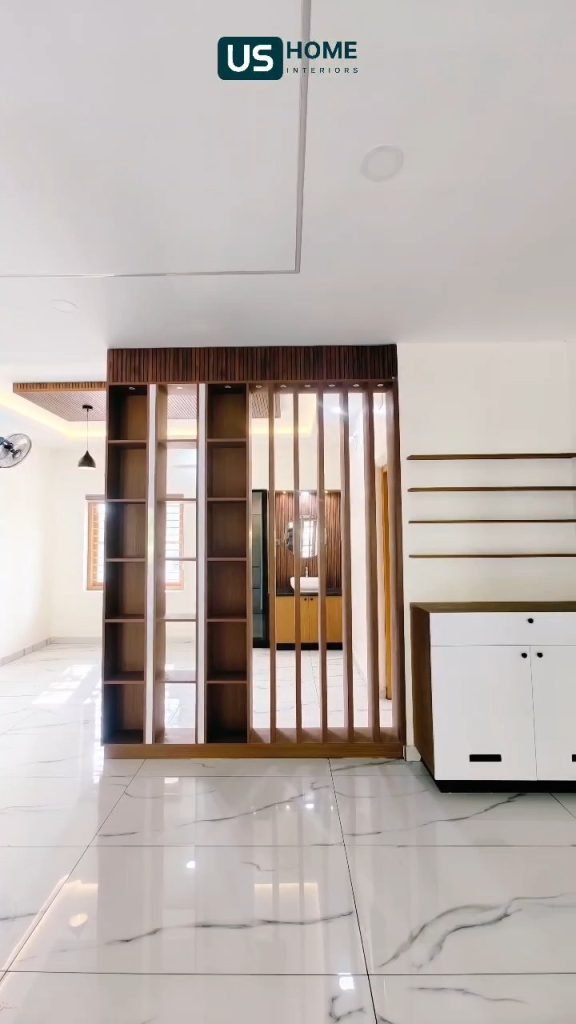 Living area with a timber slatted partition and marble floor